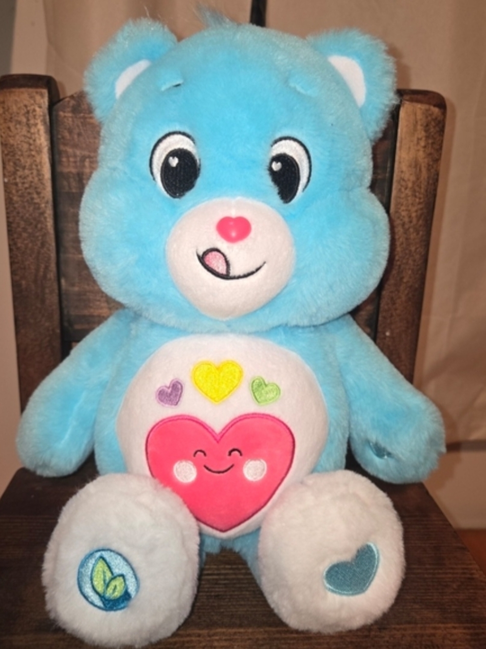 Care Bears Light Blue Plush with Pink Heart Belly and Multicolor Heart Accents